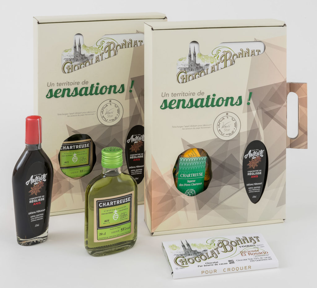 Photo du packaging Vouis'Star avec les produits Chartreuse diffusion, Antésite et Chocolat Bonnat